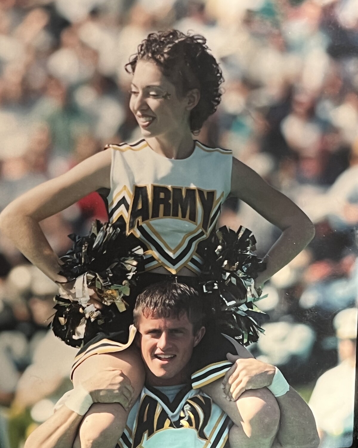 Rick and Danielle Alvarez, Army cheer squad, West Point